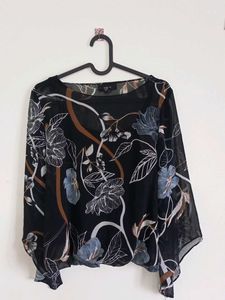 Branded floral sheer top with attached camisole