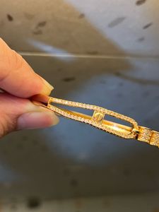 ✨ Luxury Gold-Tone Diamond-Studded Bracelet