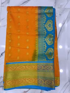 Orange and sky blue combination saree