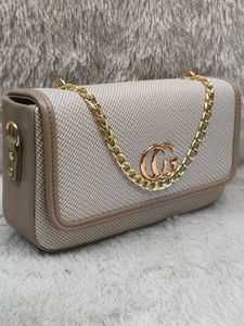 Chic Crossbody Bag with Chain Detail