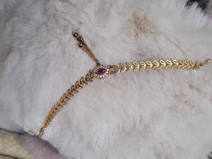 Gold Tone Hand Chain with Ruby