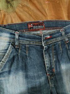 Ripped Blue Denim Jeans