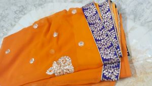 Beautiful saree..small border.1 time used..30min