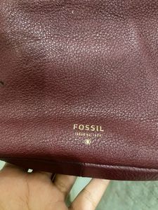 Fossil burgundy sling bag