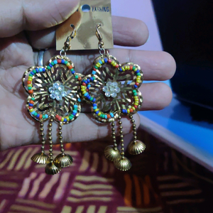 unused  long hanging earings
