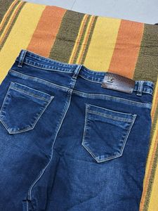 Flared Dark Wash Denim Jeans