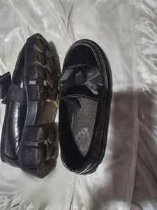 Black Loafers with Bow Detail