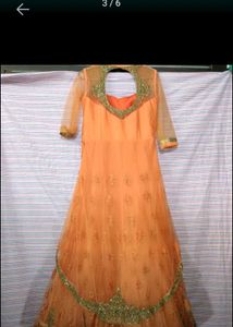 A Beautiful Party Wear Oranga Gown
