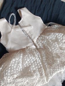 A Cute White Frilled Frock