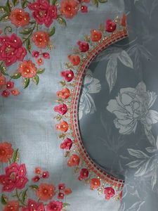 A beautiful grey lehenga with pink detailing