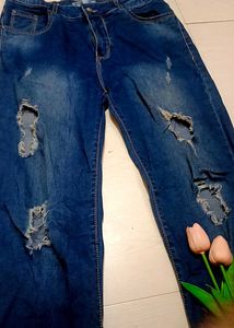 Ripped Flared Leg Jeans