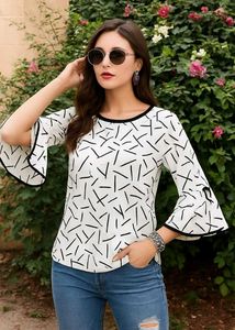 🤍✨Price Drop! Peplum Top - Geometric Print