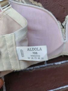 Cream lace bra.