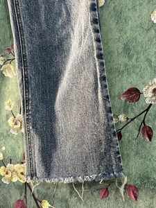 Distressed Wide Leg Denim Jeans