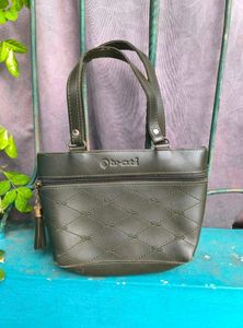 Set Of 4 Mini Handbags.