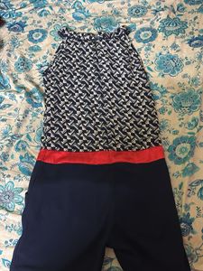 Navy Blue Sleeveless Striped Jumpsuit | Knee-Lengt