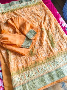 heavy peach embroidered saree
