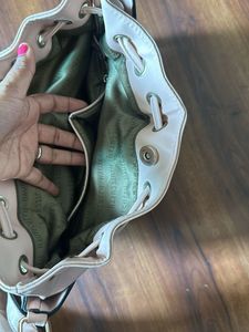Beige colour big handbag bag