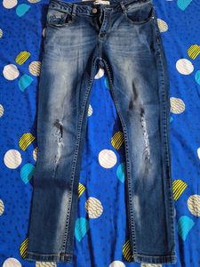 Distressed Denim Jeans