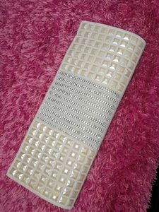 cream clutch bag