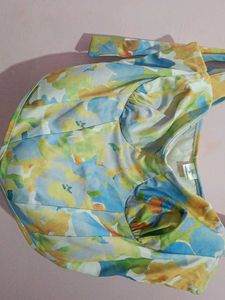 This is a multi color light weight corset top