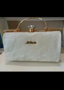 Elegant White Embossed Clutch with Gold Frame