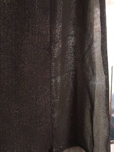 Black sleeveless blouse with lace collar