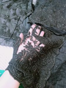 new beautiful embroidered black stone net saree.