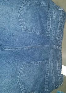 Distressed Blue Denim Jeans