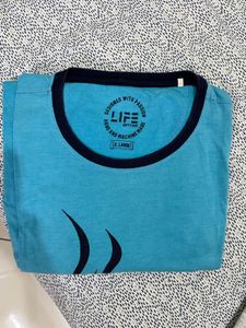 Cyan Coloured Tshirt In Very Good Condition