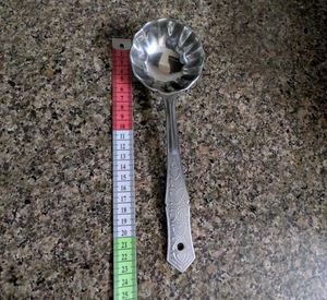 stainless steel flower shape serving ladle.