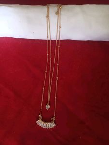 Gold Layered Necklace with Charm Detail