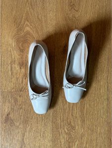 Beige Ballet Flats with Bow