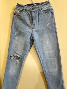 Ripped Light Wash Denim Jeans