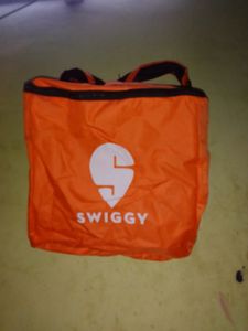 Combo Of Swiggy Bag And T Shirt🟠