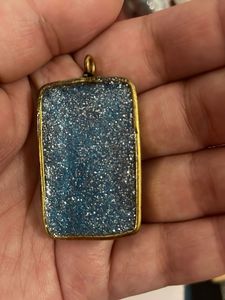 Sparkly blue resin pendant