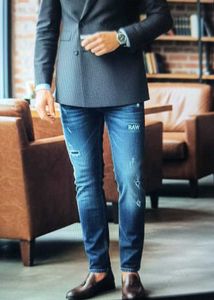Distressed Dark Wash Denim Jeans