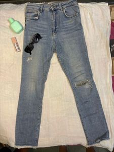 Ripped Knee Denim Jeans