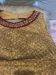 Backless golden choli