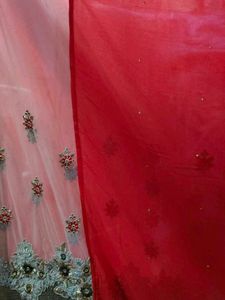 Elegant coral colour saree with blouse