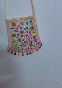 Embroidered Sling Bag with Tassels