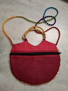 Red,rani pink, and purple Embroidered Clutches