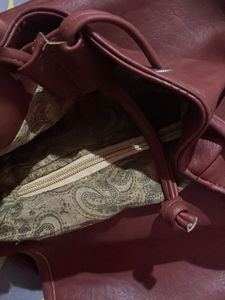 Stylish Brown Backpack Button Damaged