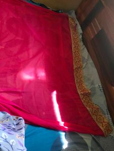 Rani Pink Chiffon Saree With Heavy Golden Border |