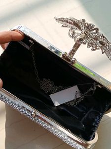 Silver Clutch With A Strap