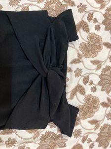 Elegant Black Strapless Jumpsuit with Bow Detail