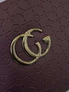Purple Embossed Top Handle Bag