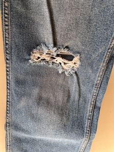 Levi’s Ripped Light Wash Jeans