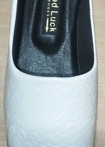 White Nagra slip-on shoes