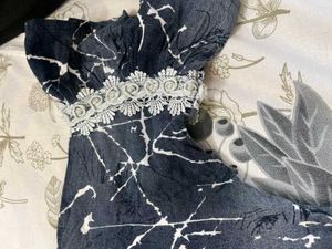 A Very Beautiful Top With Flower Detailing